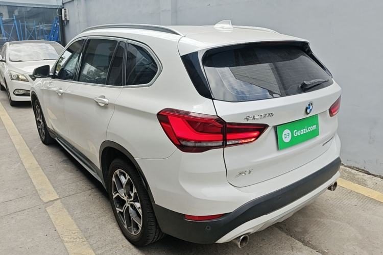 BMW X1 2022 — вид сзади слева, 111 500 км, Guazi juaynwj7as, фото 3